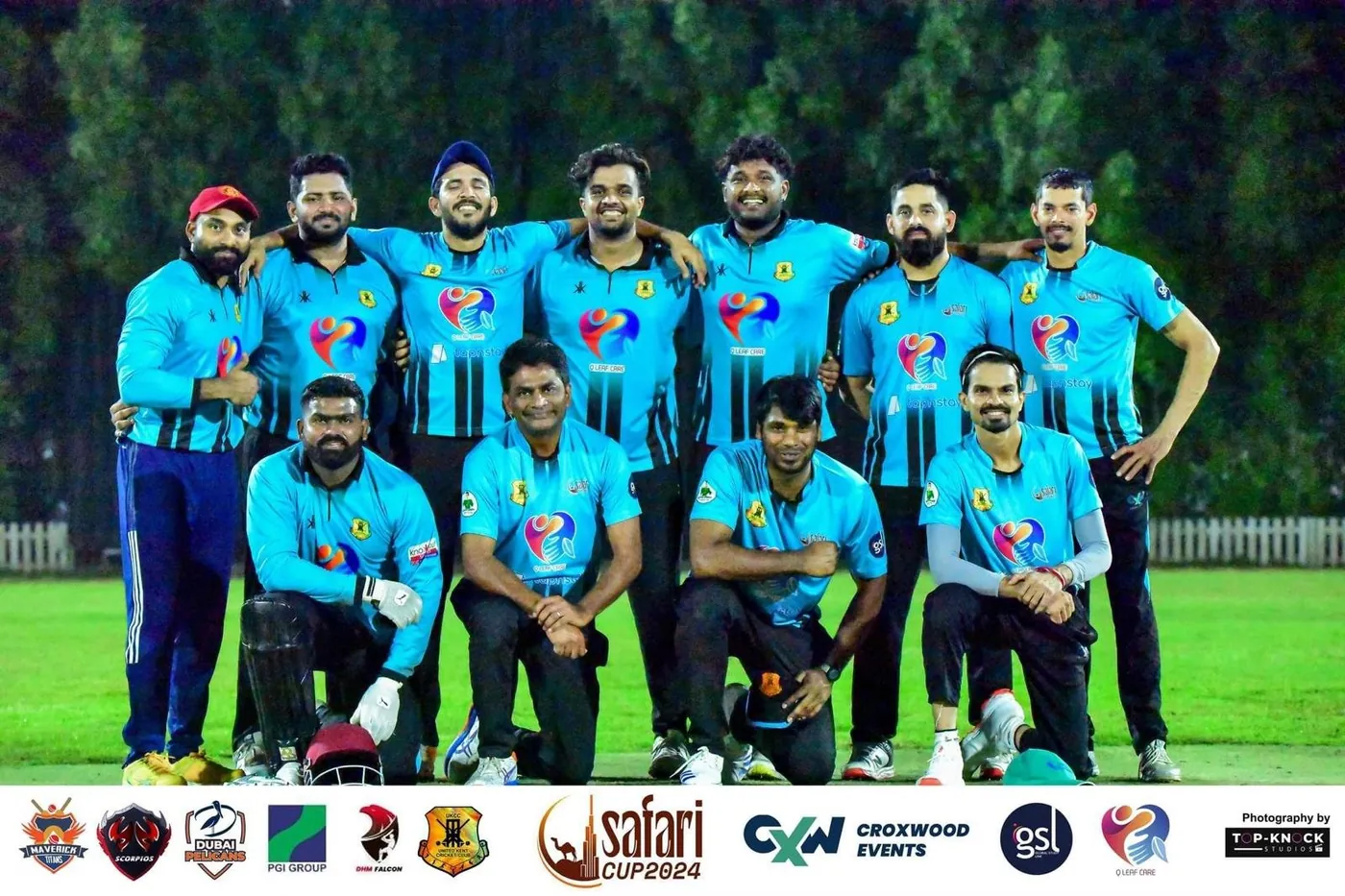 UK Bangla Tigers squad team photo in light blue kit on the field